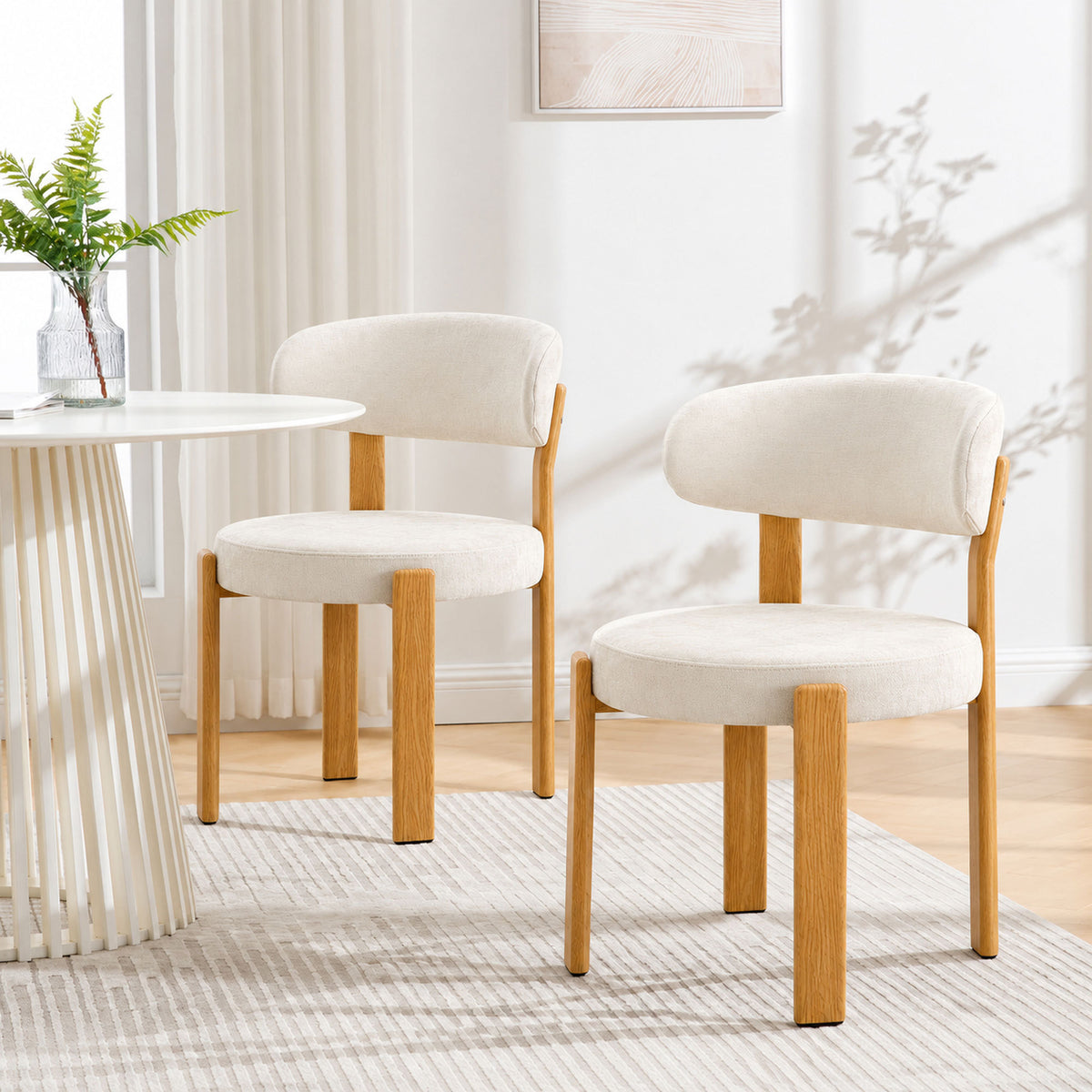 White set of 2 piece 4 piece dining chair with curved back and wooden legs