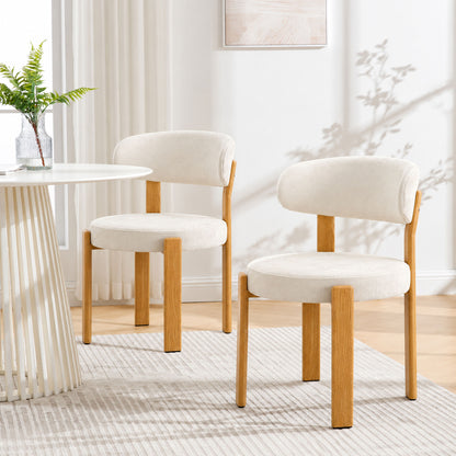 White set of 2 piece 4 piece dining chair with curved back and wooden legs