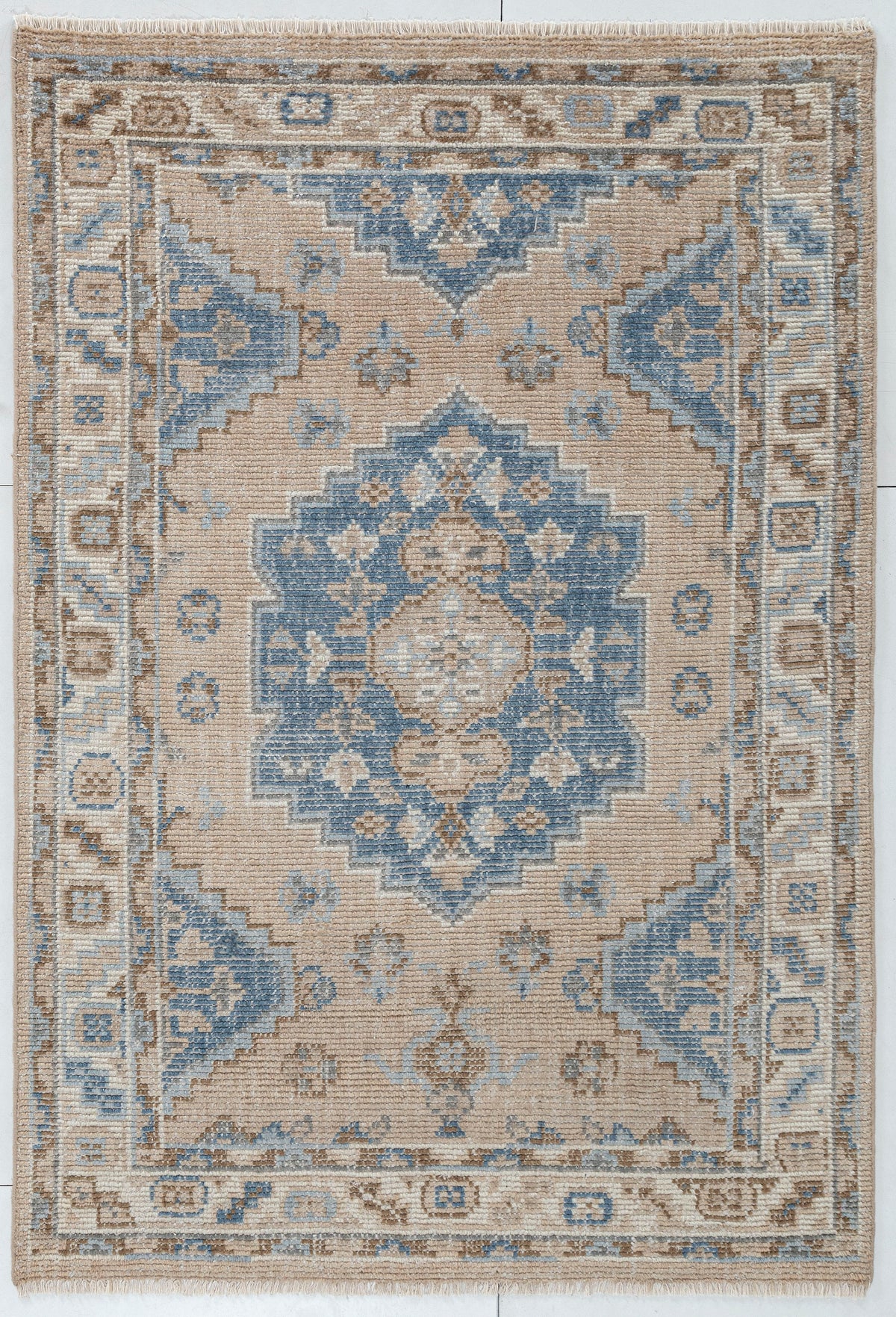 Mabira Tribal Medallion Hand Knotted Wool Rug beige 5x7 bhadohi carpet