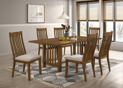 6 Seater (7pcs) A 7-piece wooden dining room set including a rectangular table and six slatted-back chairs with cream upholstered seats, shown in a bright dining room setting.