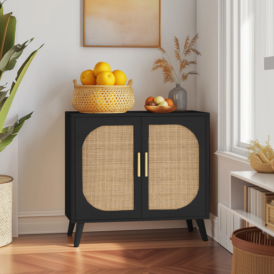 Black cabinet with wicker doors in a room with decor elements like a basket of fruit and plants.