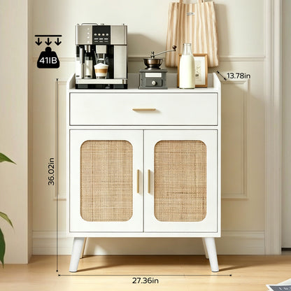 White two-door cabinet with woven cane-style door panels, a single drawer, and tapered legs, shown in a room setting with coffee and tea accessories on top. Dimension labels and a weight icon are overlaid on the image.