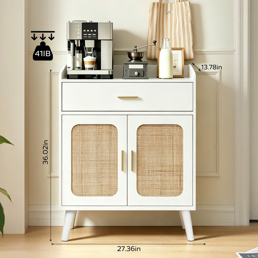 White two-door cabinet with woven cane-style door panels, a single drawer, and tapered legs, shown in a room setting with coffee and tea accessories on top. Dimension labels and a weight icon are overlaid on the image.
