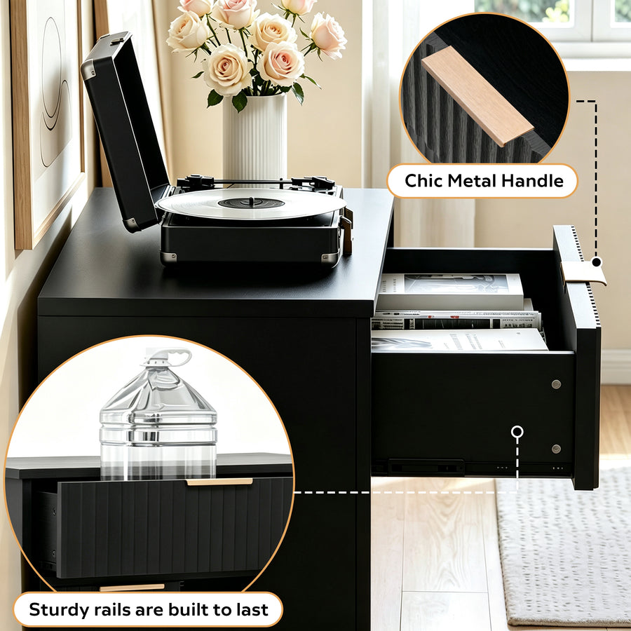 A black storage cabinet with an open drawer and a vinyl record player on top, shown in a bright room. Two circular callout insets highlight product features: one shows a metallic handle detail labeled 'Chic Metal Handle,' and the other shows a clear bottle in a drawer slot labeled 'Sturdy rails are built to last.