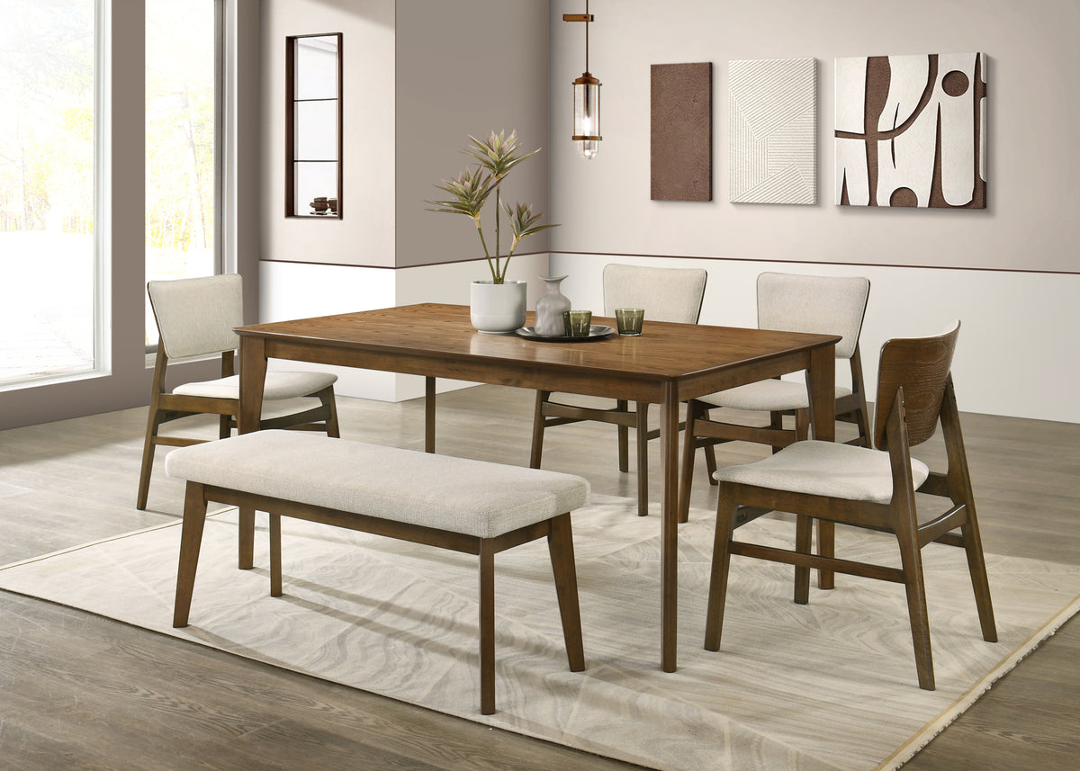6 Seater Dining room with wooden table and chairs on a light wood floor.