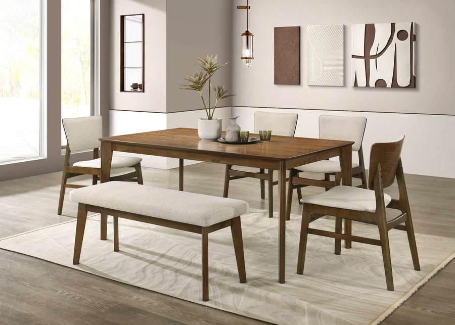 6 Seater Dining room with wooden table and chairs on a light wood floor.