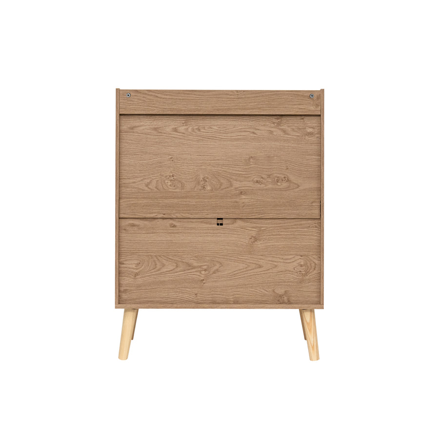 A two-drawer natural  wooden cabinet with a light oak finish and tapered wooden legs, shown against a plain background.