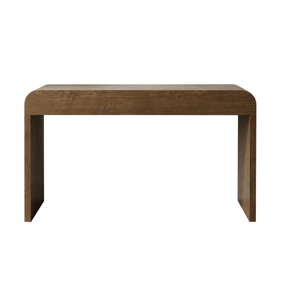A modern wooden bench with a thick, rounded rectangular seat and blocky legs, shown from a straight-on perspective against a solid white background.