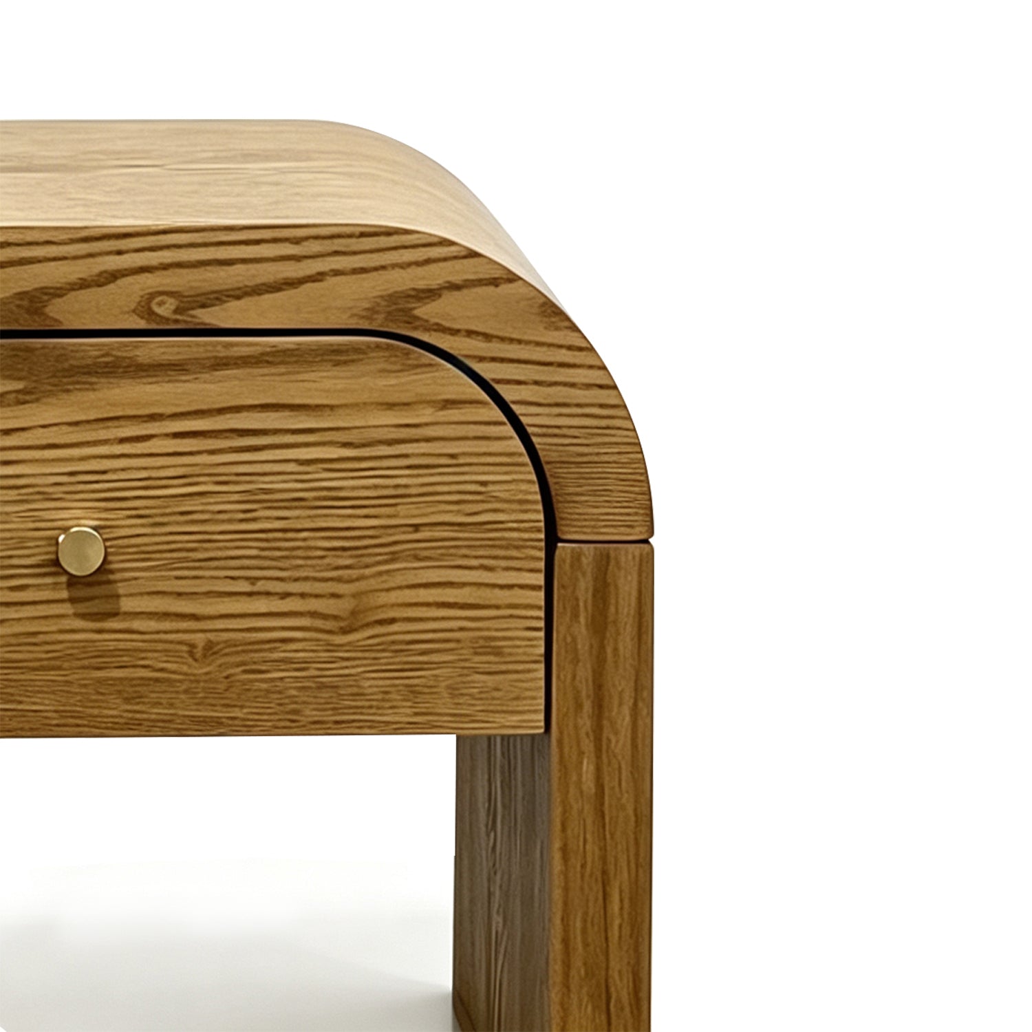 Close-up of a Walnut Brown wooden table corner showing a curved top, drawer front, brass knob, and wood grain on a white background.