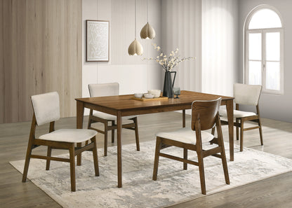 4 Seater Dining room with wooden table and chairs on a rug