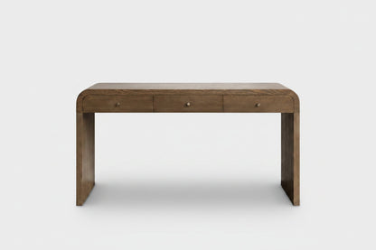A rustic brown wooden console table with three drawers and small round metal knobs, shown against a plain white background.