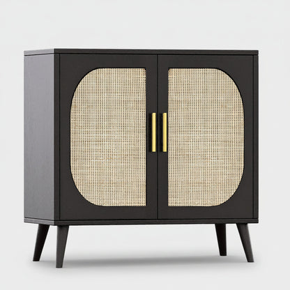 Black cabinet with rattan doors and gold handles on a white background