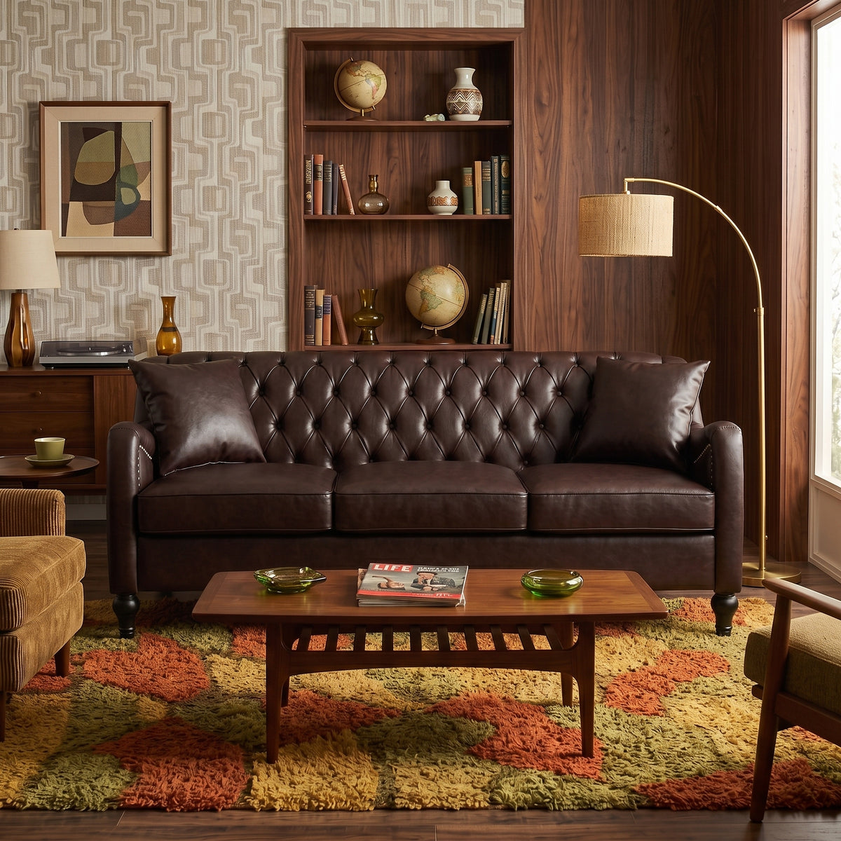 Dark Brown 3 Seater tufted leather loveseat sofa in a styled living room setting with a wooden coffee table, patterned rug, bookshelves, and a floor lamp.