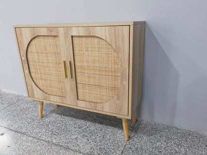 Wooden cabinet with wicker doors on a gray floor and white wall