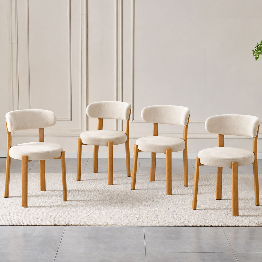 White set of 4 piece dining chair with curved back and wooden legs