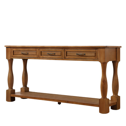 Wooden console table with three drawers and a shelf on a white background