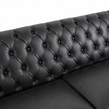 Close-up of a black tufted leather sofa back and seat cushion, showing the buttoned diamond pattern against a plain white background. black  3 Seater solo loveseat