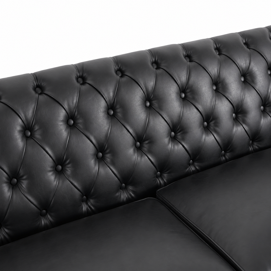 Close-up of a black tufted leather sofa back and seat cushion, showing the buttoned diamond pattern against a plain white background. black  3 Seater solo loveseat