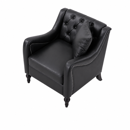 A black faux leather Chesterfield armchair with button tufting on the backrest, nailhead trim along the armrests, and turned black legs, shown with a matching throw pillow on a white background. black  Solo