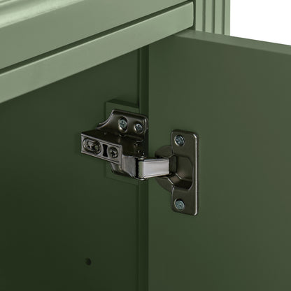 Close-up of a Olive green cabinet door with a brushed metal hinge attached to the cabinet frame.